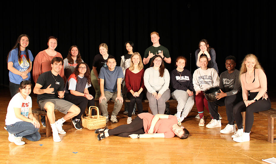 Group photo of the cast of a play