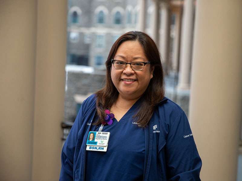 Woman in nursing scrubs