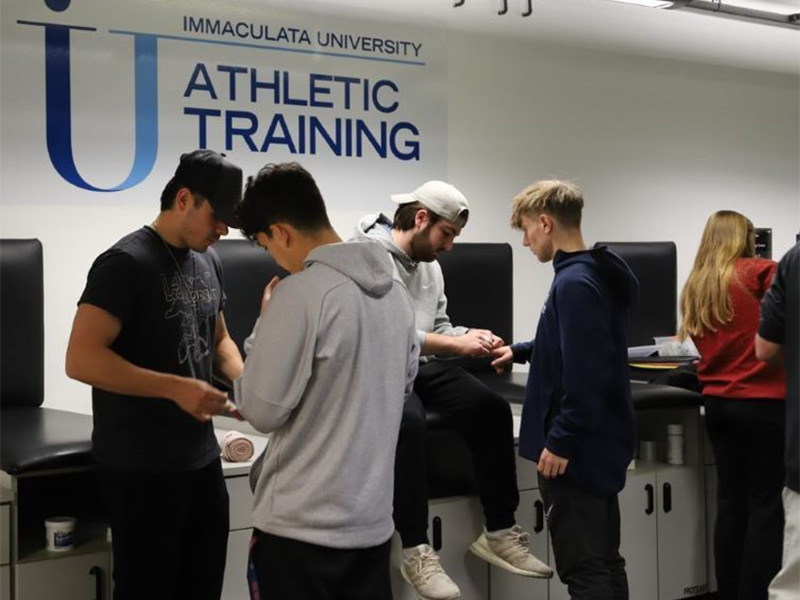 Students being treated in athletic training facility