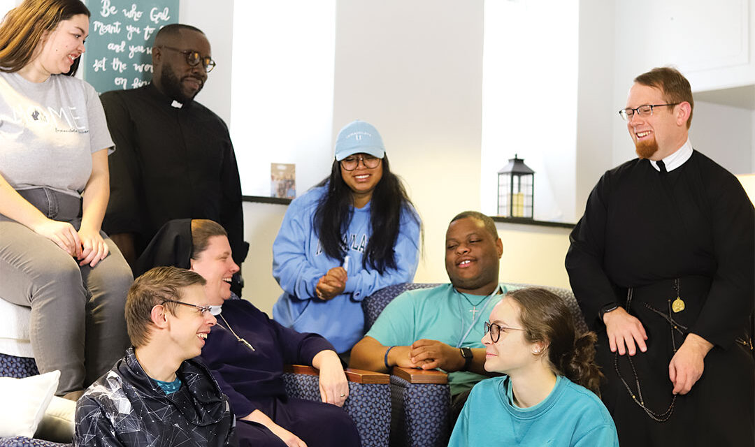 College students with nun and priests