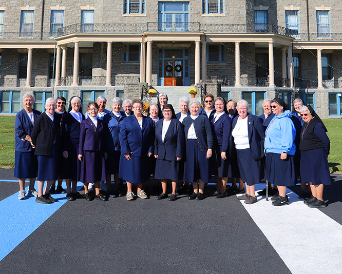 About_Mission-Heritage_IHM-Sisters_OPT-4 Group of IHM sisters on college campus
