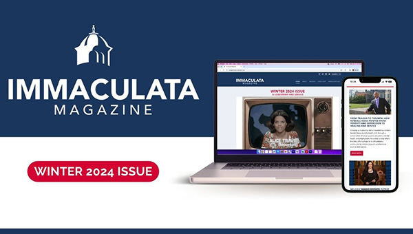 Laptop computer and smartphone showing magazine website