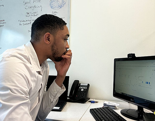 Man looking at computer screen