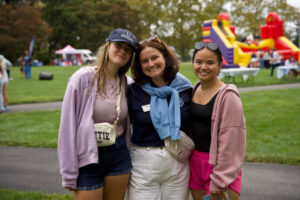 Three young women smiling for the camera