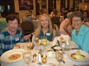 Three women at table