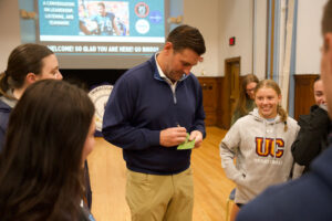 Man signing autograph