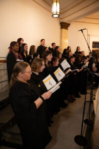 Choir members singing