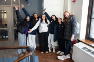Group of young women pose for photo
