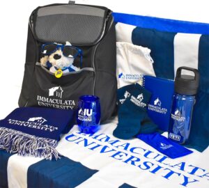 Collection of raffle items including bag, towel and cups.