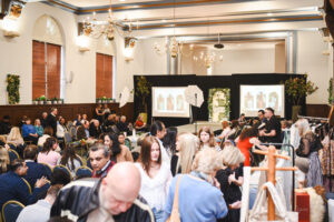 A large group of people atr fashion show