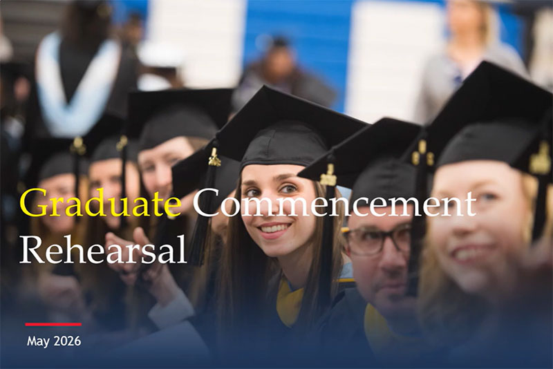 Students in cap and gown during a commencement rehearsal; overlay text reads 'Graduate Commencement Rehearsal' and 'May 2026'
